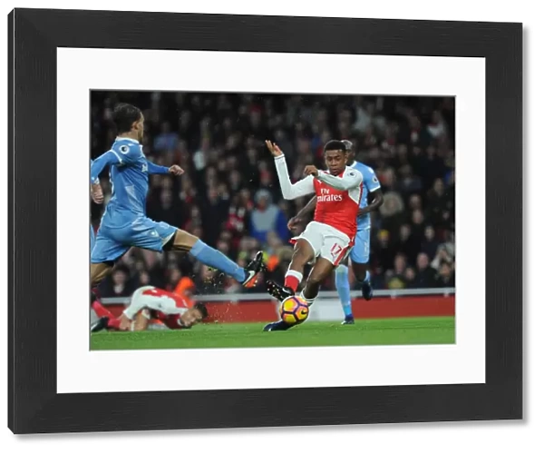 Alex Iwobi Scores Third Goal Against Marc Muniesa in Arsenal's Victory over Stoke City (2016-17)