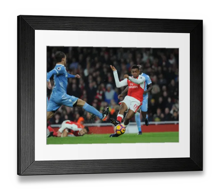 Framed Print : Alex Iwobi Scores Third Goal Against Marc Muniesa in Arsenal's Victory over Stoke City (2016-17)