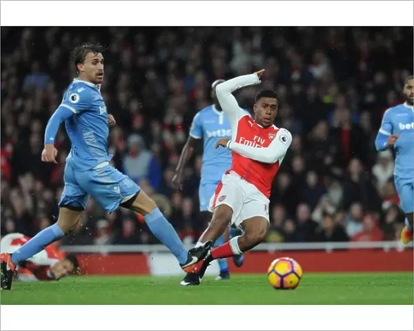 Alex Iwobi's Thrilling Goal Past Marc Muniesa: Arsenal's Victory over Stoke City (2016-17)