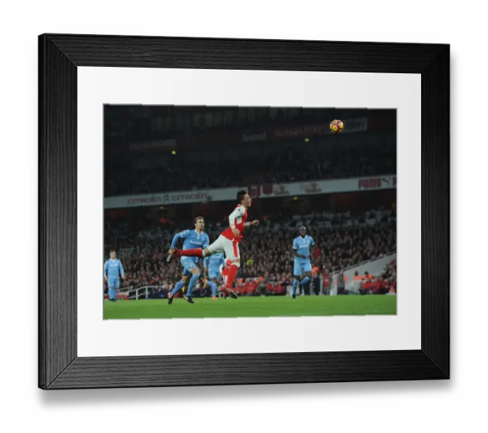 Framed Print : Mesut Ozil Scores Arsenal's Second Goal Against Stoke City (2016-17) Framed Print : Mesut Ozil Scores Arsenal's Second Goal Against Stoke City (2016-17)