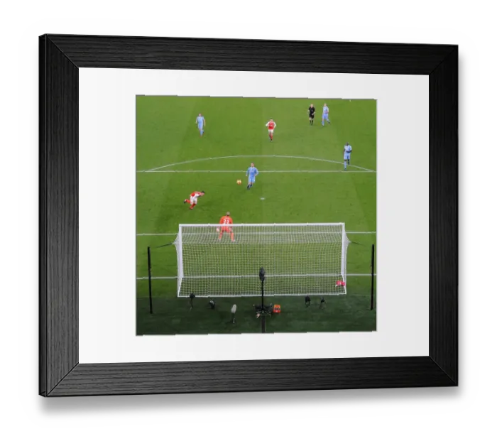 Framed Print : Mesut Ozil Scores Arsenal's Second Goal Against Stoke City (2016-17)