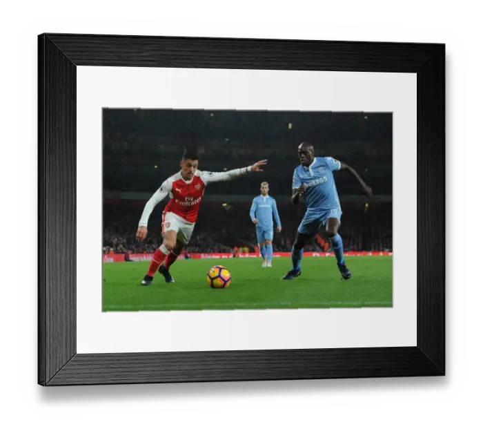 Framed Print : Clash of Titans: Sanchez vs. Martins Indi - Arsenal vs. Stoke City, Premier League