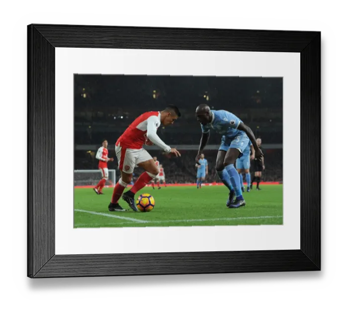 Framed Print : Clash of Stars: Sanchez vs. Martins Indi - Arsenal v Stoke City, Premier League Framed Print : Clash of Stars: Sanchez vs. Martins Indi - Arsenal v Stoke City, Premier League
