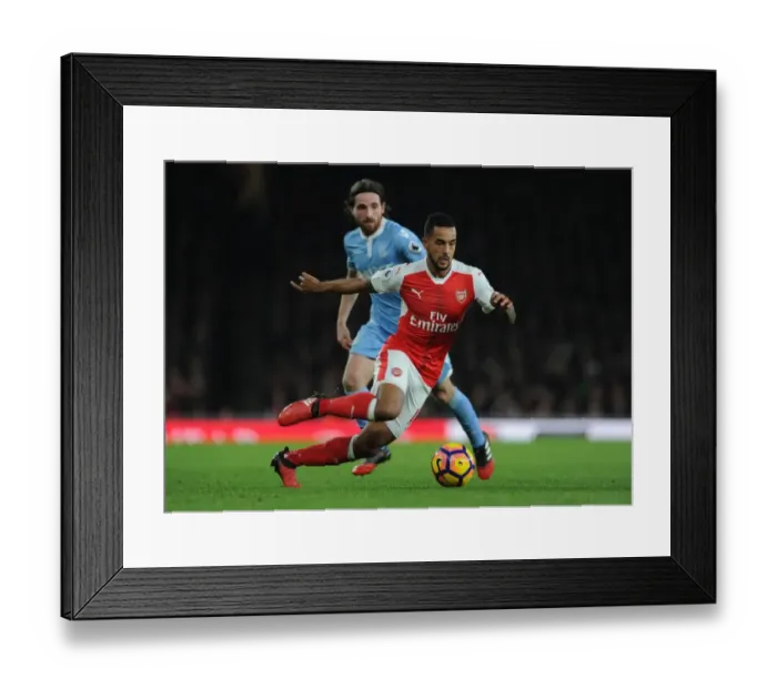 Framed Print : Theo Walcott vs Joe Allen: Intense Battle at Arsenal's Emirates Stadium (Arsenal v Stoke City, 2016-17)