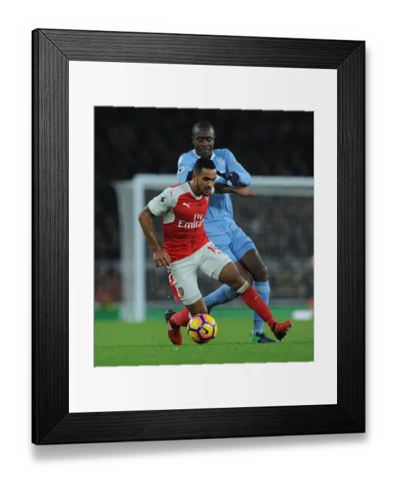 Framed Print : Arsenal's Theo Walcott Fends Off Stoke's Giannelli Imbula During Premier League Clash