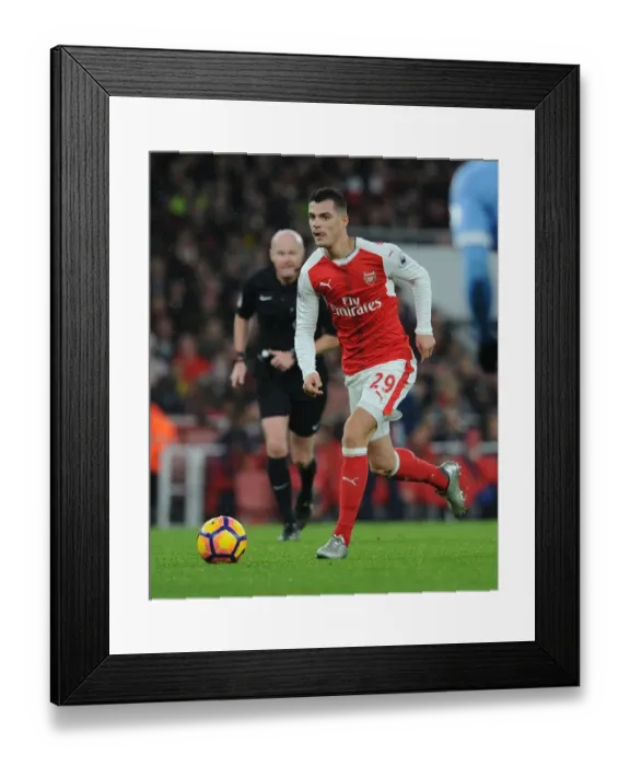 Framed Print : Granit Xhaka: Arsenal Midfielder in Action against Stoke City, Premier League 2016-17