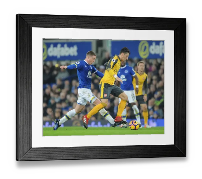 Framed Print : Mesut Ozil Breaks Past McCarthy: Everton vs Arsenal, Premier League 2016-17