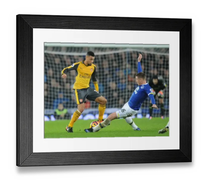 Framed Print : Coquelin vs McCarthy: A Premier League Battle at Goodison Park