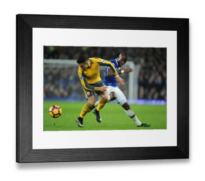 Framed Print : Clash at Goodison Park: Sanchez vs. Gueye in Everton vs. Arsenal Premier League Showdown Framed Print : Clash at Goodison Park: Sanchez vs. Gueye in Everton vs. Arsenal Premier League Showdown
