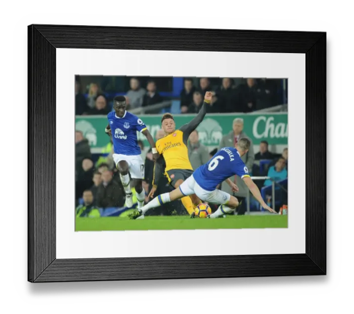 Framed Print : Oxlade-Chamberlain vs. Gueye & Jagielka: Intense Midfield Clash at Goodison Park - Everton vs. Arsenal, Premier League 2016-17 Framed Print : Oxlade-Chamberlain vs. Gueye & Jagielka: Intense Midfield Clash at Goodison Park - Everton vs. Arsenal, Premier League 2016-17