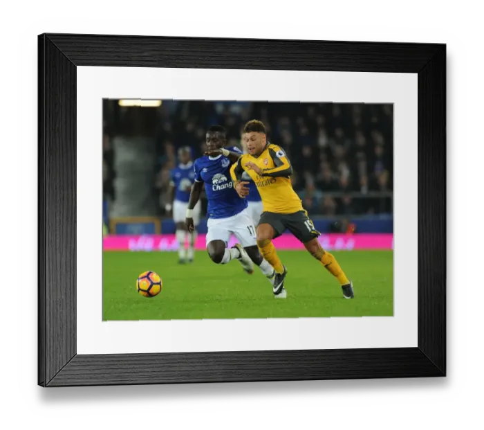Framed Print : Clash at Goodison Park: Oxlade-Chamberlain vs. Gueye in Everton vs. Arsenal Premier League Showdown