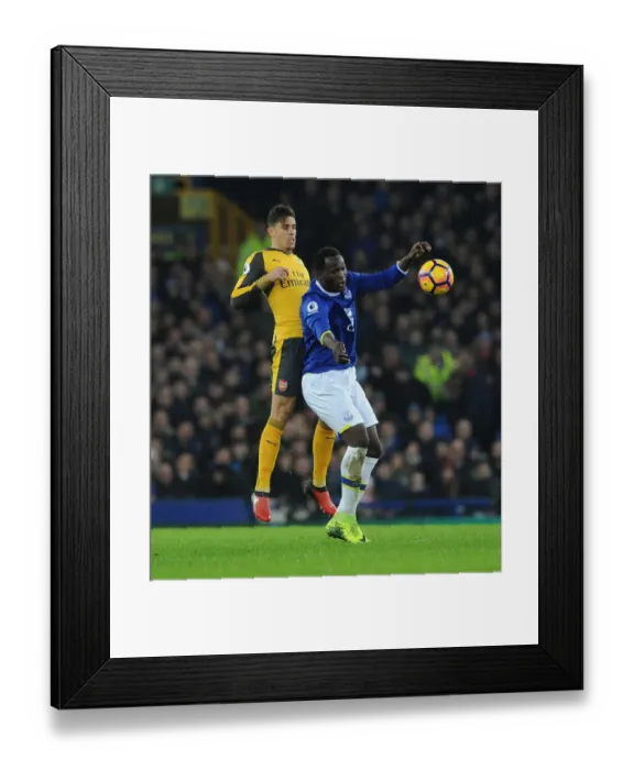 Framed Print : Gabriel vs Lukaku: A Premier League Battle at Goodison Park