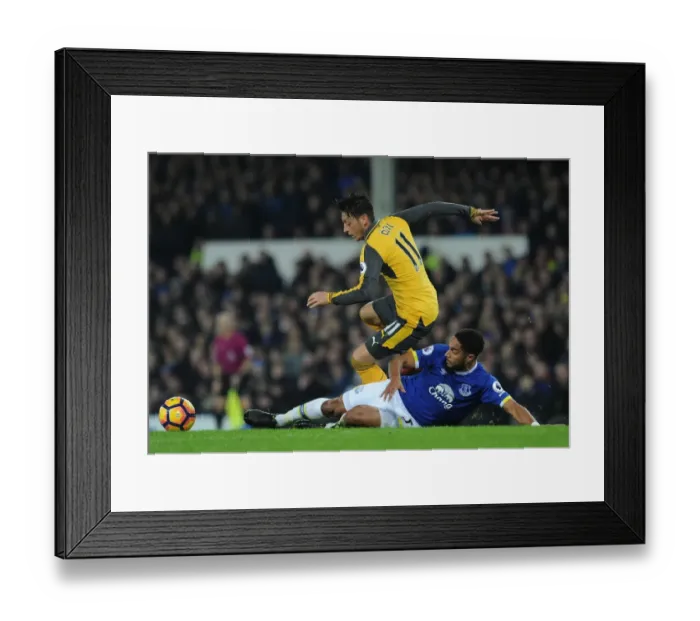 Framed Print : Mesut Ozil vs Ashley Williams: Intense Battle at Goodison Park - Everton vs Arsenal, Premier League 2016-17