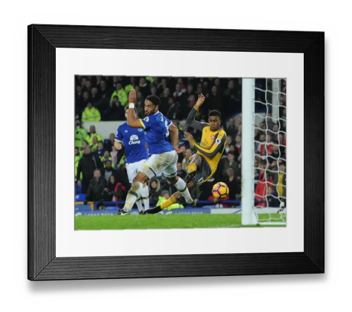 Framed Print : Arsenal's Alex Iwobi Faces Off Against Everton's Ashley Williams in Intense Premier League Showdown Framed Print : Arsenal's Alex Iwobi Faces Off Against Everton's Ashley Williams in Intense Premier League Showdown