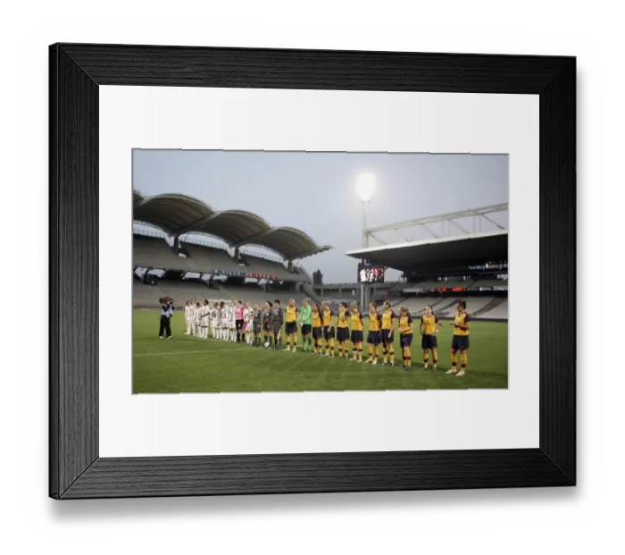 Framed Print : Arsenal Ladies line up with Lyon before the match