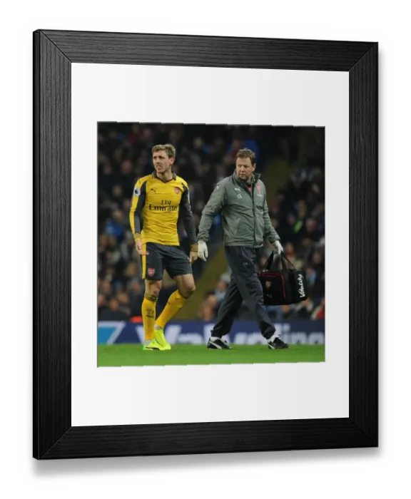 Framed Print : Nacho Monreal Receives Treatment: Manchester City vs. Arsenal, Premier League 2016-17 Framed Print : Nacho Monreal Receives Treatment: Manchester City vs. Arsenal, Premier League 2016-17