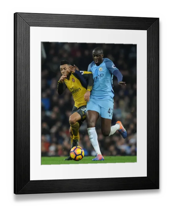 Framed Print : Coquelin vs. Toure: A Premier League Battle at the Manchester Derby (2016-17)