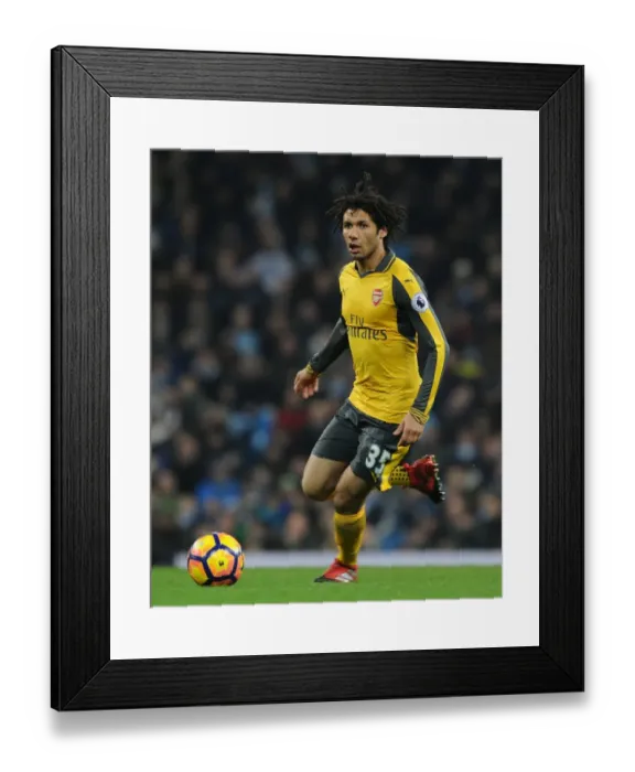 Framed Print : Arsenal's Mohamed Elneny Faces Off Against Manchester City in Premier League Clash (2016-17) Framed Print : Arsenal's Mohamed Elneny Faces Off Against Manchester City in Premier League Clash (2016-17)