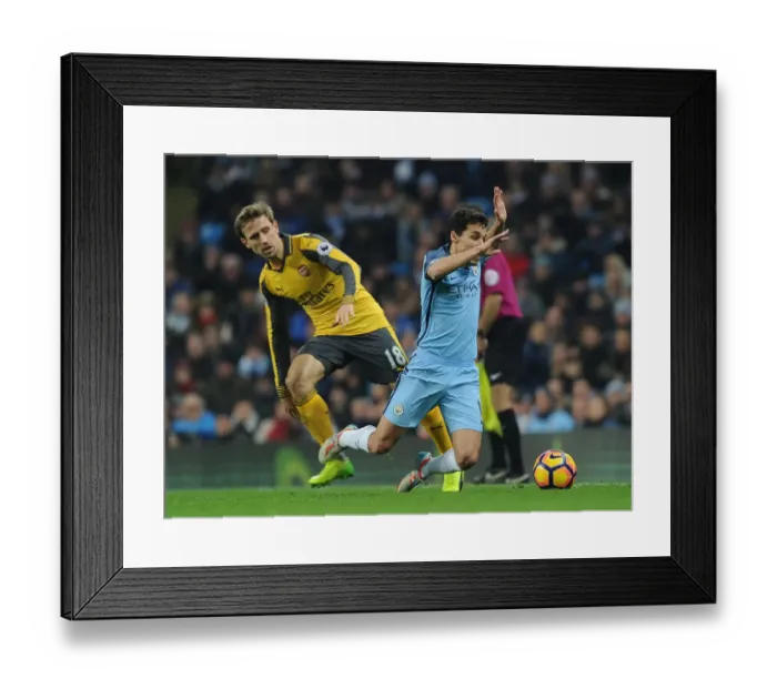 Framed Print : Nacho Monreal vs Jesus Navas: Intense Battle at Manchester City vs Arsenal, Premier League 2016-17 Framed Print : Nacho Monreal vs Jesus Navas: Intense Battle at Manchester City vs Arsenal, Premier League 2016-17