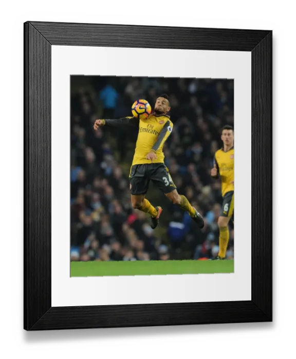 Framed Print : Francis Coquelin: Arsenal's Midfield Battle at Manchester City, 2016-17