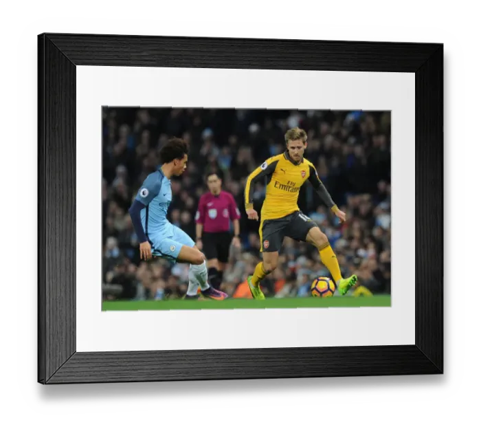 Framed Print : Monreal vs Sane: Intense Battle at Etihad Stadium - Manchester City vs Arsenal, Premier League 2016-17 Framed Print : Monreal vs Sane: Intense Battle at Etihad Stadium - Manchester City vs Arsenal, Premier League 2016-17