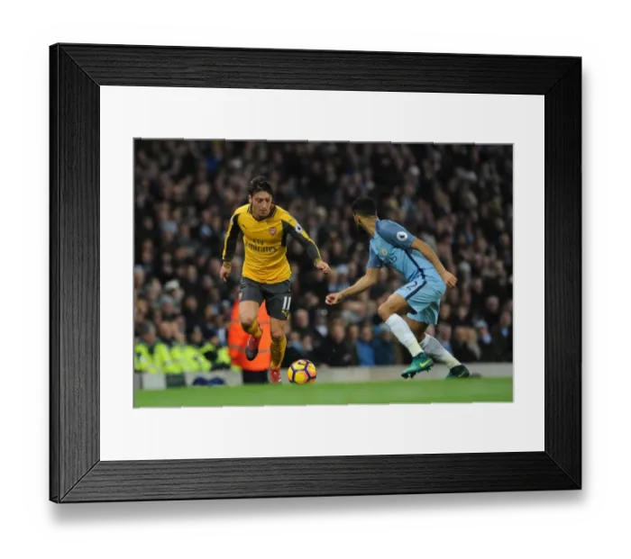 Framed Print : Mesut Ozil (Arsenal) Gael Clichy (Man City). Manchester City 2: 1 Arsenal. Premier League Framed Print : Mesut Ozil (Arsenal) Gael Clichy (Man City). Manchester City 2: 1 Arsenal. Premier League