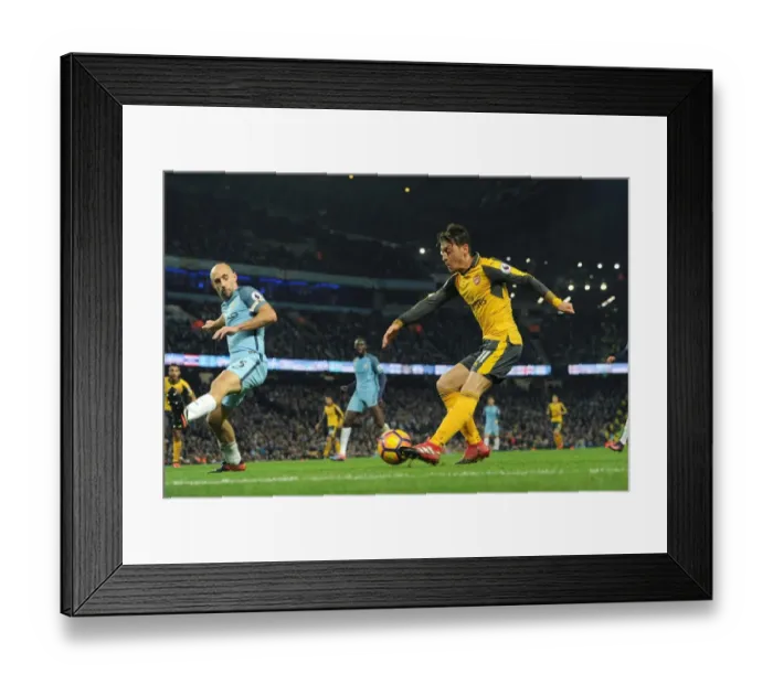 Framed Print : Mesut Ozil vs Pablo Zabaleta: Intense Battle at Etihad Stadium (Manchester City vs Arsenal, 2016-17)