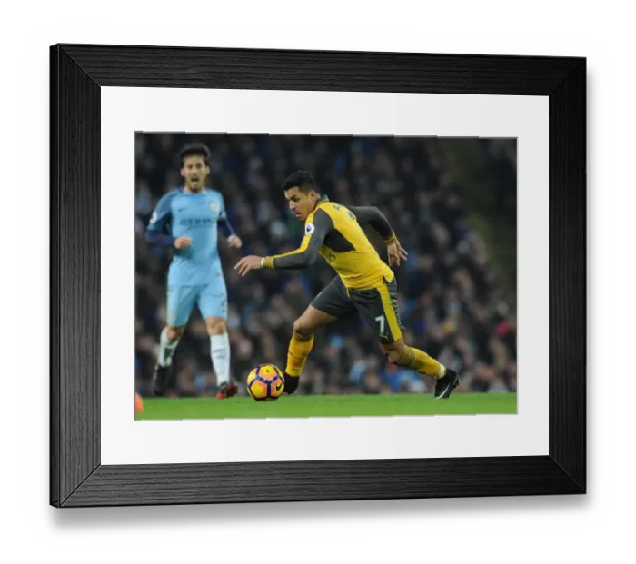 Framed Print : Alexis Sanchez's Heartbreaker: Manchester City Edge Past Arsenal 2-1 in Premier League Clash