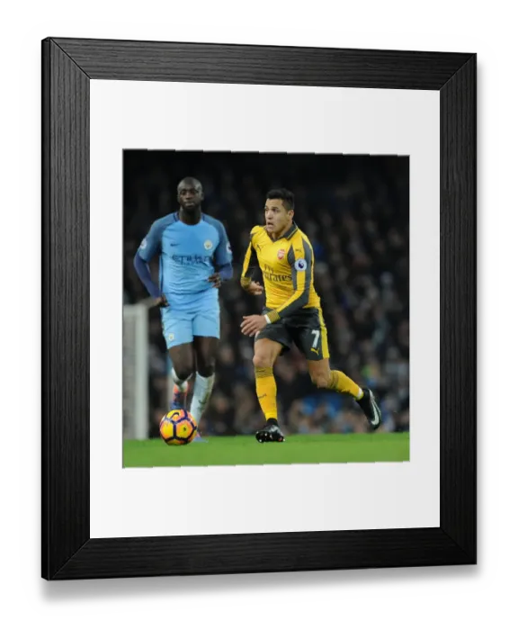 Framed Print : Alexis Sanchez (Arsenal). Manchester City 2: 1 Arsenal. Premier League. Eithad Stadium Framed Print : Alexis Sanchez (Arsenal). Manchester City 2: 1 Arsenal. Premier League. Eithad Stadium