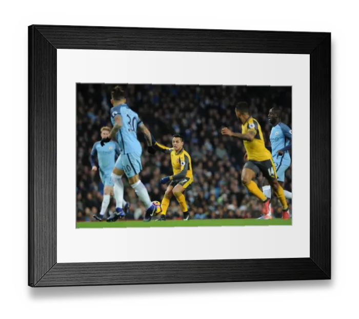 Framed Print : Alexis Sanchez (Arsenal) assist for Theo Walcott goal. Manchester City 2: 1 Arsenal Framed Print : Alexis Sanchez (Arsenal) assist for Theo Walcott goal. Manchester City 2: 1 Arsenal