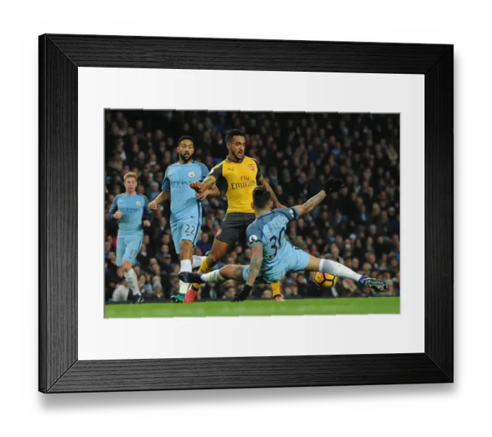 Framed Print : Theo Walcott (Arsenal) Nicolas Otamendi (Man City) Framed Print : Theo Walcott (Arsenal) Nicolas Otamendi (Man City)