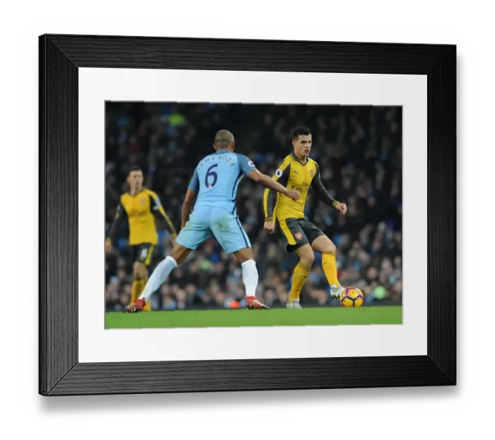 Framed Print : Xhaka vs. Fernandinho: Intense Battle in Manchester City vs. Arsenal Premier League Clash Framed Print : Xhaka vs. Fernandinho: Intense Battle in Manchester City vs. Arsenal Premier League Clash