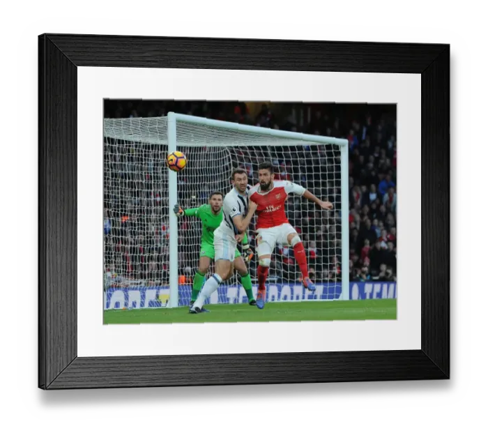 Framed Print : Arsenal's Olivier Giroud Faces Off Against West Brom's Gareth McAuley in Premier League Clash