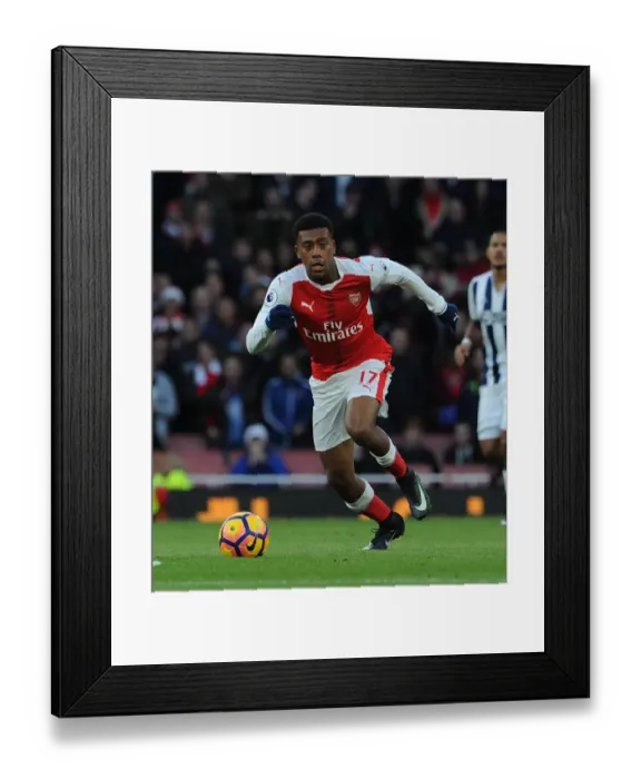 Framed Print : Alex Iwobi (Arsenal). Arsenal 1: 0 West Bromwich Albion. Premier League. Emirates Stadium Framed Print : Alex Iwobi (Arsenal). Arsenal 1: 0 West Bromwich Albion. Premier League. Emirates Stadium
