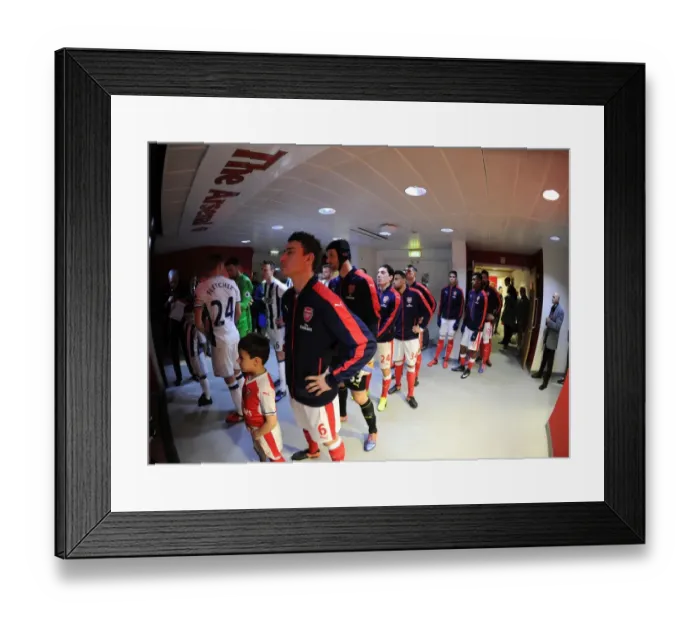 Framed Print : Arsenal's Unyielding Defender: Laurent Koscielny's Pre-Match Focus vs. West Bromwich Albion (2016-17)
