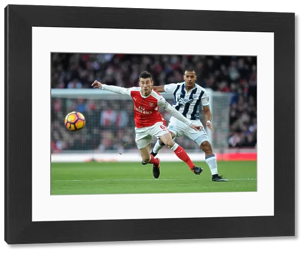 Arsenal's Koscielny Fends Off Rondon: Arsenal v West Bromwich Albion, Premier League (2016-17)