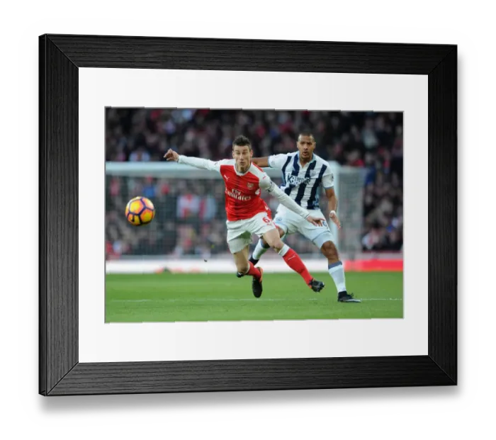 Framed Print : Arsenal's Koscielny Fends Off Rondon: Arsenal v West Bromwich Albion, Premier League (2016-17) Framed Print : Arsenal's Koscielny Fends Off Rondon: Arsenal v West Bromwich Albion, Premier League (2016-17)