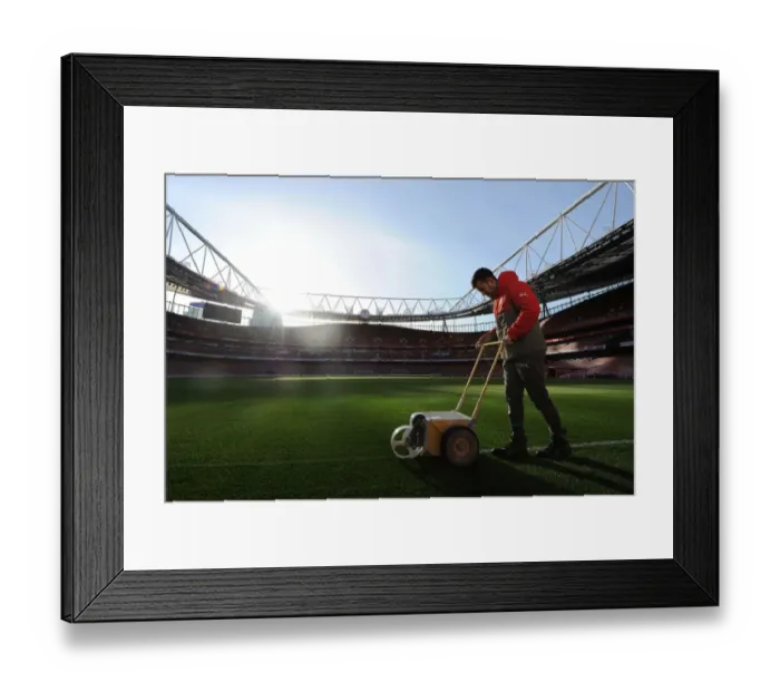 Framed Print : Arsenal's Groundsman Prepares the Pitch for Arsenal v West Bromwich Albion (2016-17) Framed Print : Arsenal's Groundsman Prepares the Pitch for Arsenal v West Bromwich Albion (2016-17)
