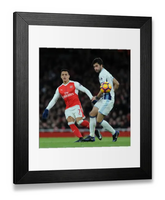 Framed Print : Arsenal's Alexis Sanchez Fends Off West Brom's Claudio Yacob