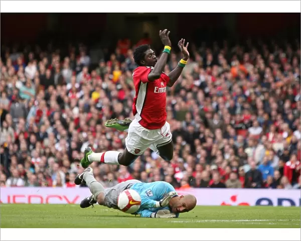 Emmanuel Adebayor (Arsenal) Tim Howard (Everton)