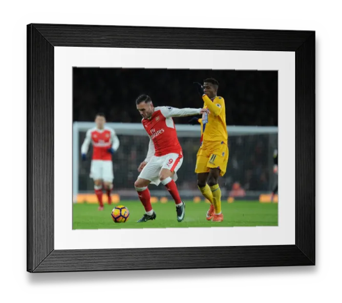 Framed Print : Arsenal vs Crystal Palace: Lucas Perez Clashes with Wilfred Zaha in Premier League Showdown