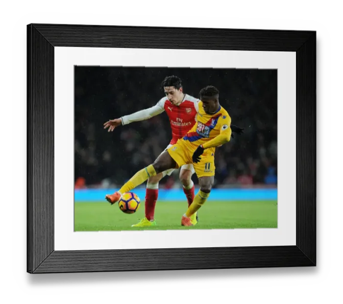 Framed Print : Arsenal vs Crystal Palace: Hector Bellerin Faces Off Against Wilfred Zaha in Intense Premier League Clash