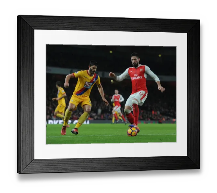 Framed Print : Giroud vs Tomkins: Intense Battle in Arsenal vs Crystal Palace Premier League Clash