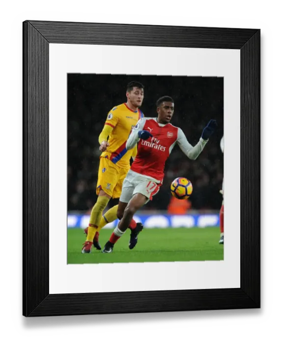 Framed Print : Arsenal's Alex Iwobi Dashes Past Crystal Palace's Joel Ward in Premier League Clash