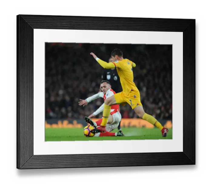 Framed Print : Arsenal vs. Crystal Palace: Lucas Perez Tackles Joel Ward in Premier League Clash at Emirates Stadium Framed Print : Arsenal vs. Crystal Palace: Lucas Perez Tackles Joel Ward in Premier League Clash at Emirates Stadium
