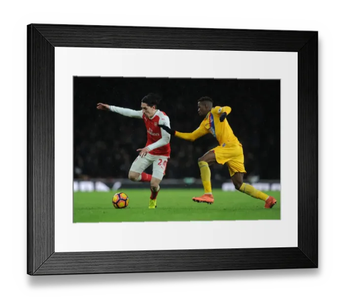 Framed Print : Arsenal's Hector Bellerin Faces Off Against Crystal Palace's Wilfred Zaha in Premier League Clash Framed Print : Arsenal's Hector Bellerin Faces Off Against Crystal Palace's Wilfred Zaha in Premier League Clash