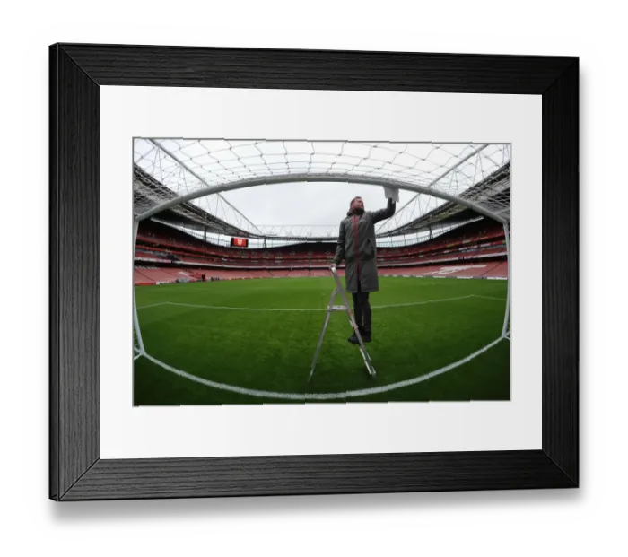 Framed Print : Arsenal Groundsman Prepares Emirates Stadium for Arsenal vs. Crystal Palace: Premier League Match Framed Print : Arsenal Groundsman Prepares Emirates Stadium for Arsenal vs. Crystal Palace: Premier League Match