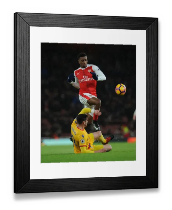 Framed Print : Arsenal vs Crystal Palace: Intense Battle between Alex Iwobi and Joel Ward in the Premier League Framed Print : Arsenal vs Crystal Palace: Intense Battle between Alex Iwobi and Joel Ward in the Premier League