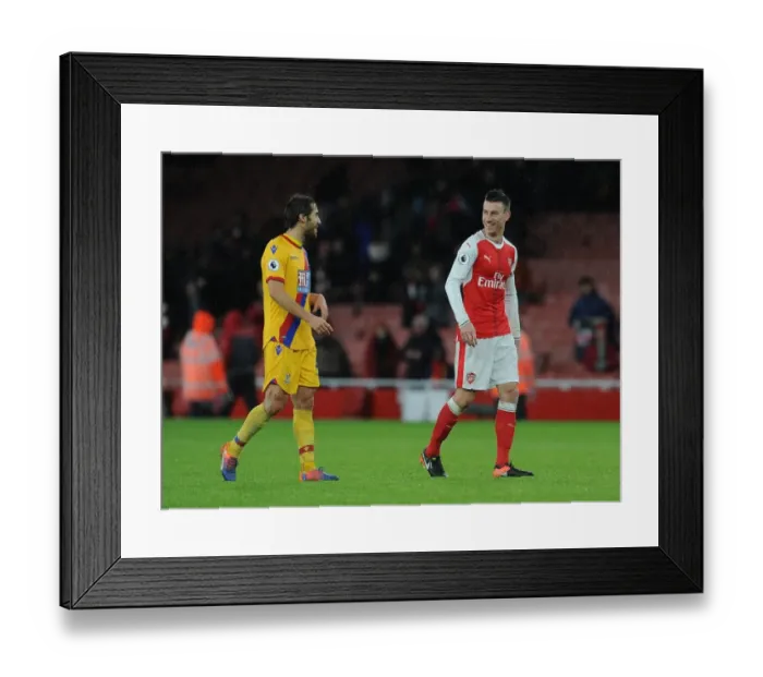 Framed Print : Arsenal's Koscielny and Flamini Share a Moment After Arsenal v Crystal Palace Match, 2016-17
