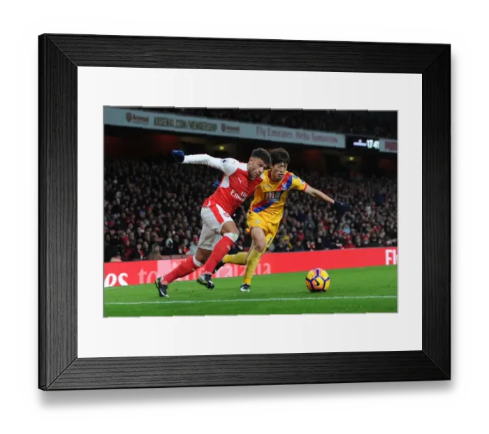 Framed Print : Intense Battle: Oxlade-Chamberlain vs. Lee - Arsenal vs. Crystal Palace Rivalry Framed Print : Intense Battle: Oxlade-Chamberlain vs. Lee - Arsenal vs. Crystal Palace Rivalry
